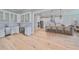 Spacious open-concept kitchen features bright white cabinetry, stainless appliances, and lots of countertop space at 3812 W Sevilla St, Tampa, FL 33629