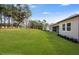 Expansive backyard offering plenty of space and green grass at 4656 Southern Valley Loop, Brooksville, FL 34601
