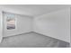 Bedroom featuring neutral carpet and bright window at 4656 Southern Valley Loop, Brooksville, FL 34601