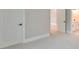 Bedroom with carpet, white doors and a view of another room at 3812 W Sevilla St, Tampa, FL 33629