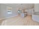 Open concept kitchen with island and hardwood floors at 3812 W Sevilla St, Tampa, FL 33629