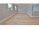 Bright bonus room with hardwood floors and neutral wall colors at 3812 W Sevilla St, Tampa, FL 33629