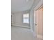 Bright bedroom with carpet flooring and a window at 3812 W Sevilla St, Tampa, FL 33629