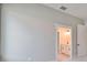 Bedroom with carpet flooring and a view into the bathroom at 3812 W Sevilla St, Tampa, FL 33629