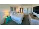 Spacious bedroom with king-size bed and ensuite bathroom at 7530 Palm Island S Dr # 1413, Placida, FL 33946