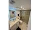 Clean bathroom with walk-in shower and single vanity at 7530 Palm Island S Dr # 1413, Placida, FL 33946