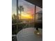 Stunning sunset view from screened porch overlooking the ocean at 7530 Palm Island S Dr # 1413, Placida, FL 33946