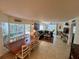 Living room with ocean view, comfortable seating, and coastal decor at 7530 Palm Island S Dr # 1413, Placida, FL 33946