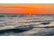 Beautiful ocean sunset with waves rolling ashore at 7530 Palm Island S Dr # 1413, Placida, FL 33946