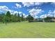 Community park with swings and playground equipment at 19462 Paddock View Dr, Tampa, FL 33647