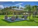 Relaxing picnic area with covered tables and grills at 19462 Paddock View Dr, Tampa, FL 33647