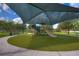 Playground with shade structure and playset at 19462 Paddock View Dr, Tampa, FL 33647