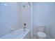 Clean bathroom with a bathtub and tiled walls at 19462 Paddock View Dr, Tampa, FL 33647