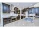 Modern kitchen with stainless steel appliances and granite countertops at 19462 Paddock View Dr, Tampa, FL 33647