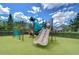 playground with modern equipment and turf at 19462 Paddock View Dr, Tampa, FL 33647