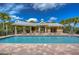 Community pool with plenty of lounge chairs at 19462 Paddock View Dr, Tampa, FL 33647