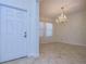 Bright dining room with chandelier and tile floors at 19462 Paddock View Dr, Tampa, FL 33647