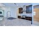 Kitchen island with granite countertop and large stainless steel sink at 19462 Paddock View Dr, Tampa, FL 33647