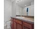 Bathroom with wood vanity and shower/tub combo at 6950 Towering Spruce Dr, Riverview, FL 33578