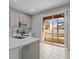 Modern kitchen with stainless steel appliances and island at 6950 Towering Spruce Dr, Riverview, FL 33578