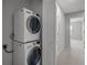 Stackable washer and dryer in a laundry closet at 6950 Towering Spruce Dr, Riverview, FL 33578
