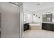 Bathroom boasts a corner soaking tub and dual vanities at 19433 Whispering Brook Dr, Tampa, FL 33647