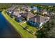 Aerial of homes with pool and waterfront access at 19433 Whispering Brook Dr, Tampa, FL 33647