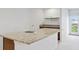 Wet bar with granite countertop and a convenient sink at 19433 Whispering Brook Dr, Tampa, FL 33647