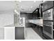 Modern kitchen with stainless steel appliances and granite countertops at 19433 Whispering Brook Dr, Tampa, FL 33647
