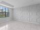 Spacious dining area with large window and unique wall design at 19433 Whispering Brook Dr, Tampa, FL 33647