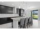 Modern kitchen with stainless steel appliances and granite countertops at 19433 Whispering Brook Dr, Tampa, FL 33647