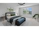 Spacious main bedroom with plush bedding and ample natural light at 19433 Whispering Brook Dr, Tampa, FL 33647