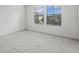 Spacious bedroom with plush carpeting and ample natural light at 19433 Whispering Brook Dr, Tampa, FL 33647