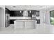 Modern kitchen with stainless steel appliances and granite countertops at 19433 Whispering Brook Dr, Tampa, FL 33647