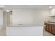 Wet bar with granite countertop and dark brown cabinets at 19433 Whispering Brook Dr, Tampa, FL 33647