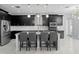 Modern kitchen with stainless steel appliances and granite countertops at 19433 Whispering Brook Dr, Tampa, FL 33647