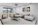 Relaxing living room featuring a sectional sofa and coffee table at 19433 Whispering Brook Dr, Tampa, FL 33647