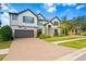 Two-story home with stone accents at 19433 Whispering Brook Dr, Tampa, FL 33647