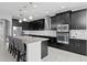 Modern kitchen with stainless steel appliances and granite countertops at 19433 Whispering Brook Dr, Tampa, FL 33647