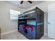 Bedroom with a bunk bed and window at 1045 West Ave, Clearwater, FL 33755