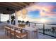 Oceanview balcony dining area with comfortable seating for six at 10126 Gulf Blvd # Ph1, Treasure Island, FL 33706