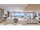 Open concept kitchen with marble island, high-end appliances, and ocean view at 10126 Gulf Blvd # Ph1, Treasure Island, FL 33706