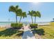 Charming beach access with lush landscaping and clear water views at 800 S Gulfview Blvd # 903, Clearwater Beach, FL 33767