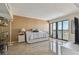Serene bedroom with a daybed and a view from the balcony doors at 800 S Gulfview Blvd # 903, Clearwater Beach, FL 33767