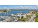 Aerial view of a marina and waterfront community, with boats and water views at 800 S Gulfview Blvd # 903, Clearwater Beach, FL 33767