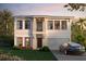 Two-story home exterior with modern design and landscaping at 3316 N Ridge Ave, Tampa, FL 33603