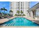 Inviting community pool with ample deck space and shade structures at 331 Cleveland St # 2206, Clearwater, FL 33755