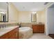 Spa-like bathroom with a large soaking tub and double vanities at 331 Cleveland St # 2206, Clearwater, FL 33755