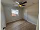 Bright bedroom with hardwood floors and ceiling fan at 1010 E Flora St, Tampa, FL 33604