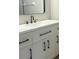 Bathroom with white vanity and black accents at 3002 W Cleveland St # E1, Tampa, FL 33609